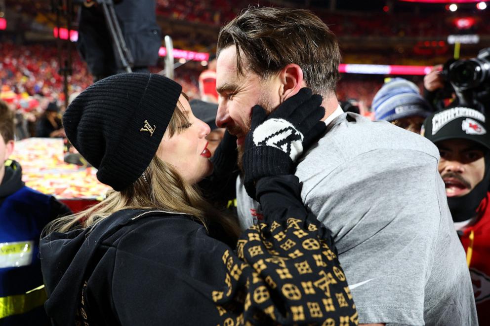 PHOTO: NTaylor Swift and Travis Kelce react after the AFC Championship game against the Buffalo Bills at GEHA Field at Arrowhead Stadium, Jan. 26, 2025. 