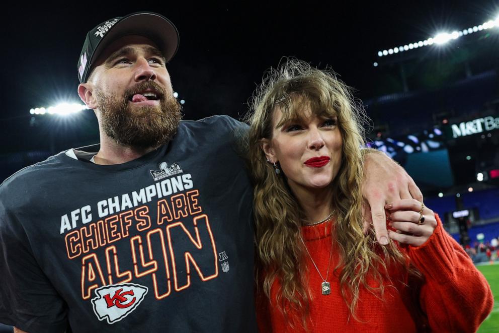 PHOTO: Travis Kelce #87 of the Kansas City Chiefs celebrates with Taylor Swift after defeating the Baltimore Ravens in the AFC Championship Game at M&T Bank Stadium on January 28, 2024 in Baltimore, Maryland.