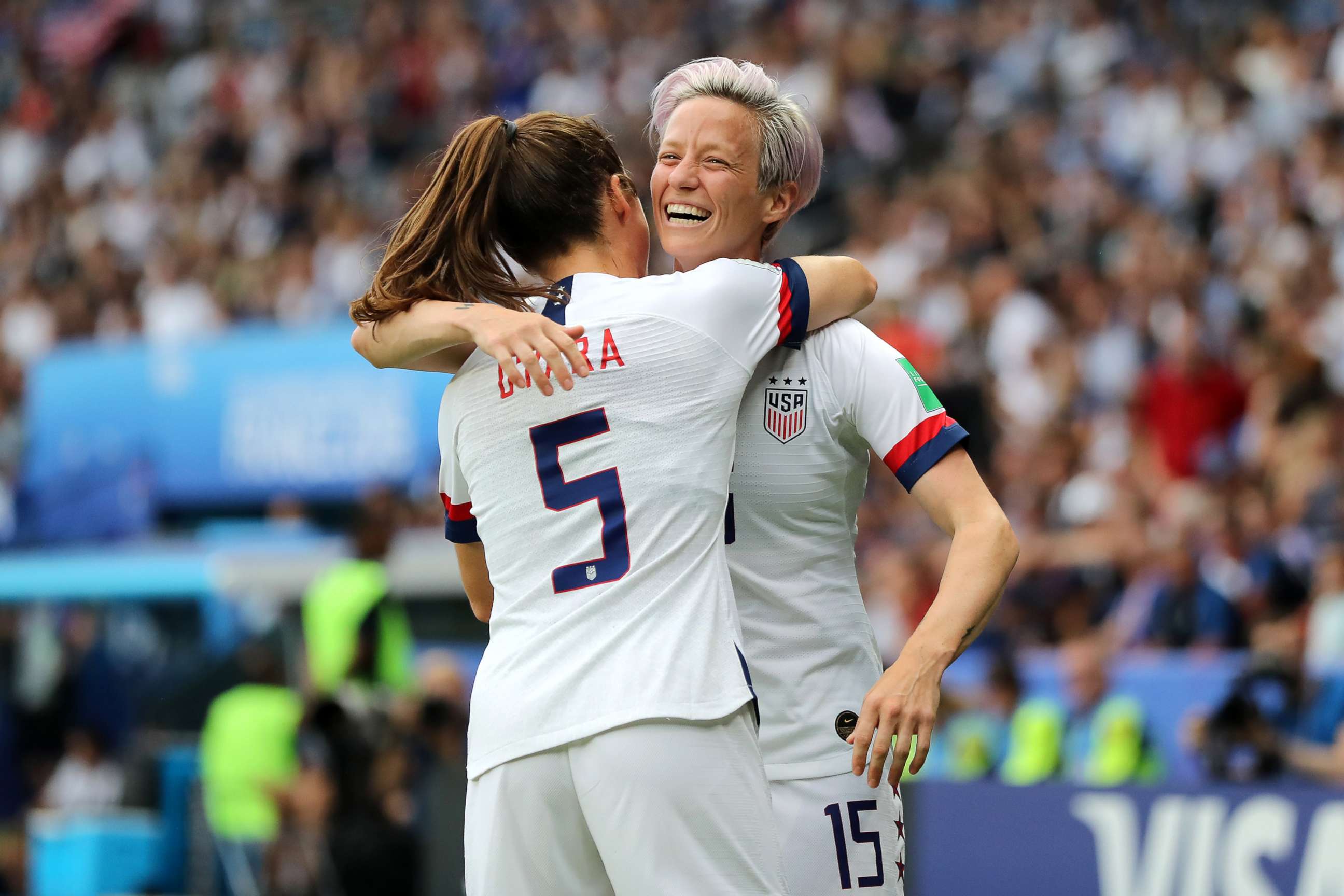 PHOTO: Megan Rapinoe of the USA celebrates with teammate Kelley O'hara after scoring her team's first goal during the 2019 FIFA Women's World Cup France Quarter Final match between France and USA at Parc des Princes, June 28, 2019 in Paris.