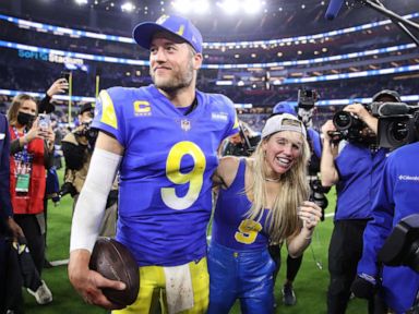 Matthew Stafford's wife Kelly embraces Rams QB on field