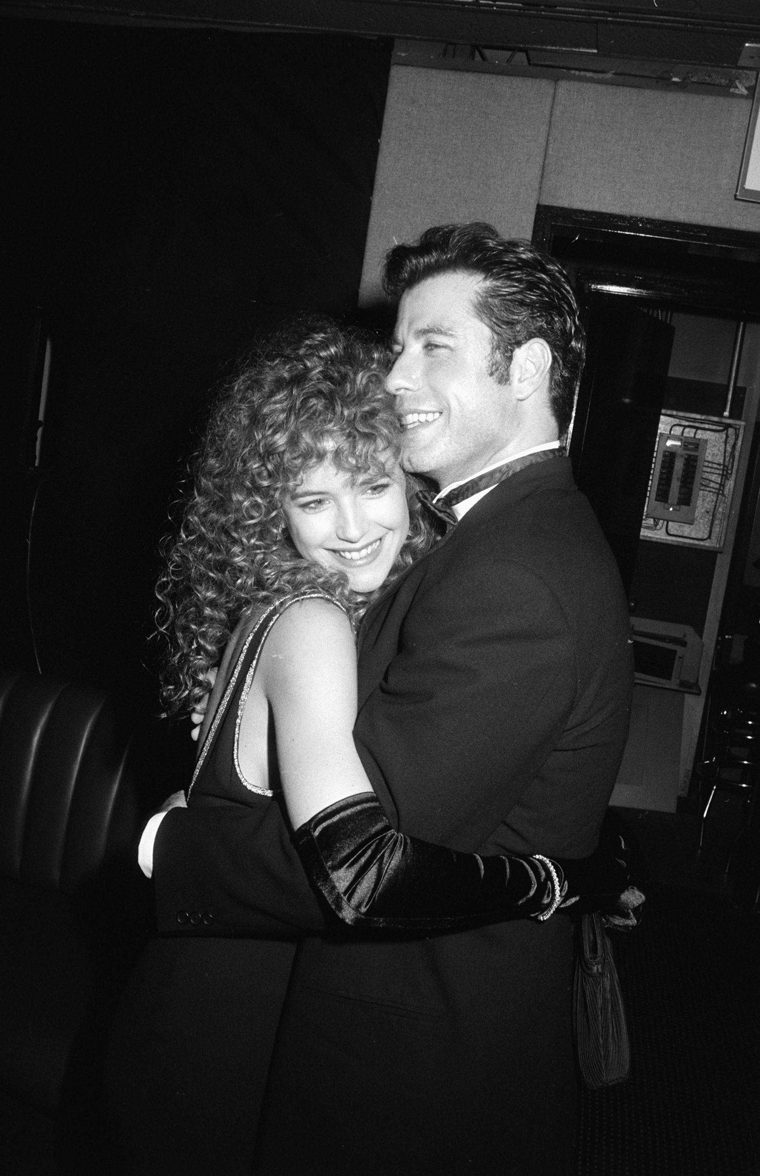 PHOTO: Kelly Preston and John Travolta hug at the Los Angeles premiere of "Look Who's Talking Too," at the Plitt Theatre in Century City, Calif., Dec. 13, 1990.