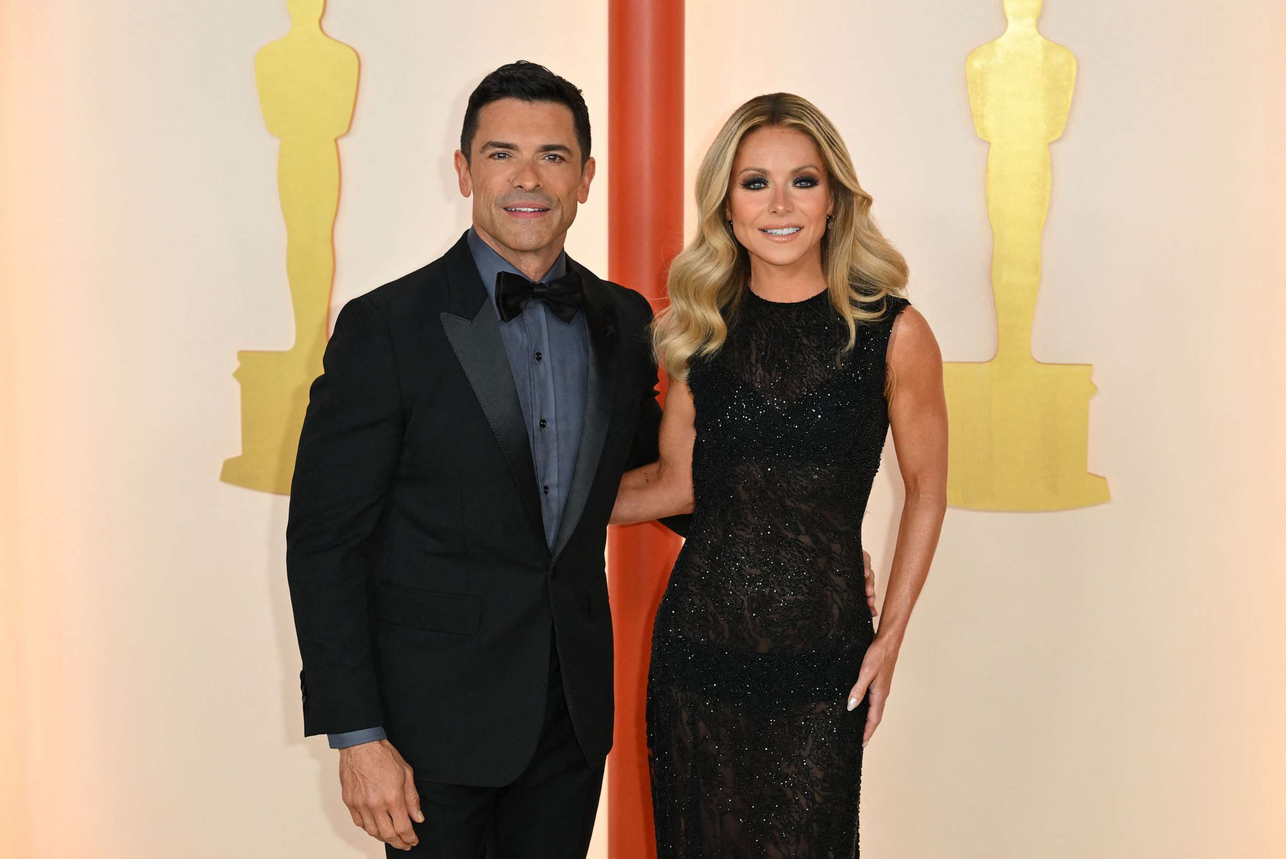 PHOTO: Mark Consuelos and his wife Kelly Ripa attend the 95th Annual Academy Awards at the Dolby Theatre, March 12 2023, in Hollywood, Calif.