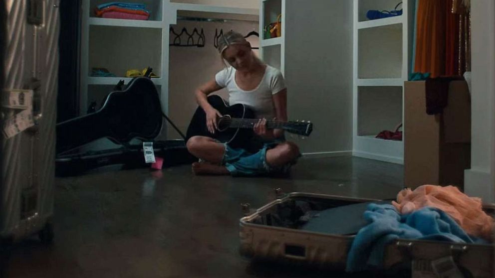 PHOTO: Kelsea Ballerini in a still from the short film "Rolling Up the Welcome Mat."