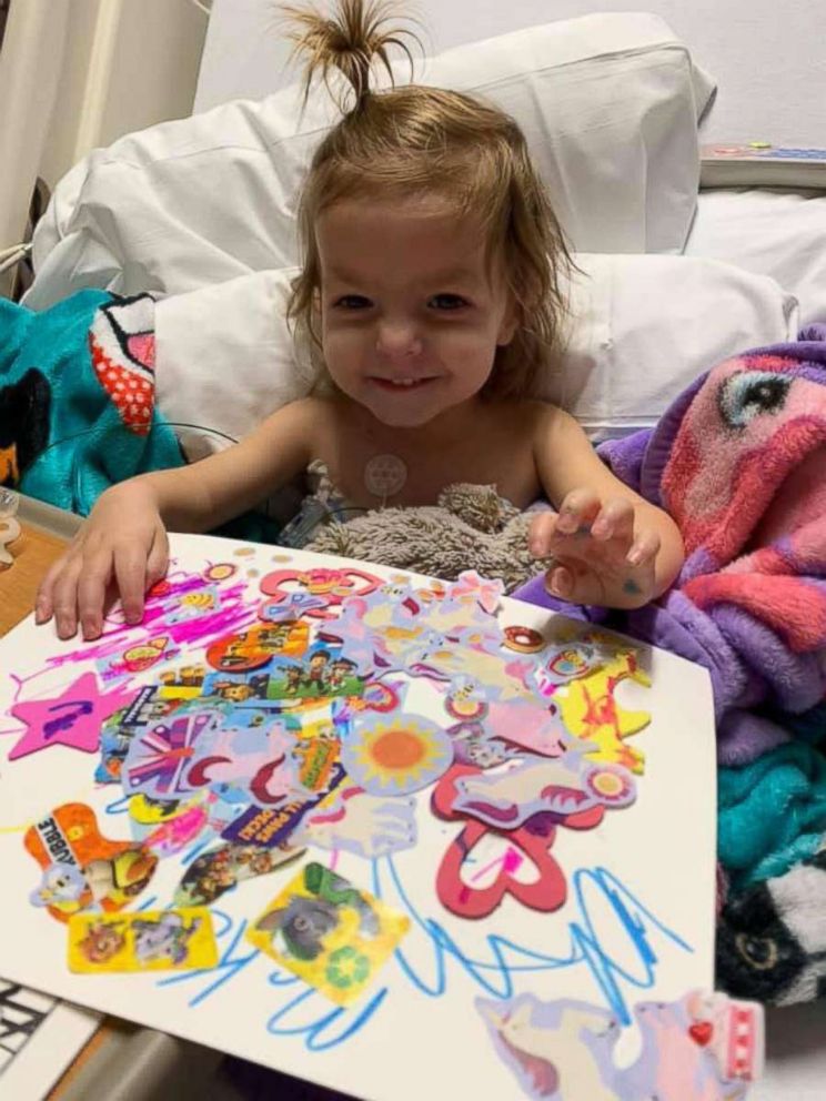 PHOTO: McKenna Shea Xydias, known to family and friends as Kenni, colors in her hospital room during cancer treatments at CHOA Scottish Rite hospital in Atlanta.