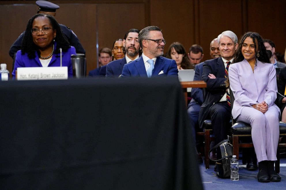 PHOTO: Supreme Court nominee Judge Ketanji Brown Jackson listens during her confirmation hearing before the Senate Judiciary Committee, March 21, 2022, on Capitol Hill in Washington, D.C., with her husband Dr. Patrick Jackson and daughter Leila.