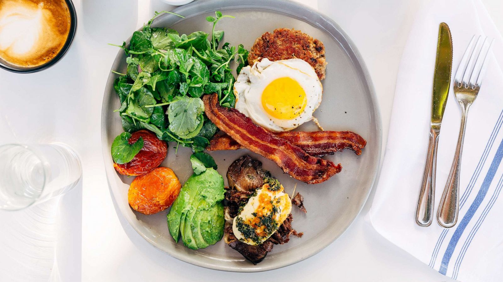 PHOTO: A keto diet friendly breakfast includes eggs, bacon, avocado, tomatoes and salad.