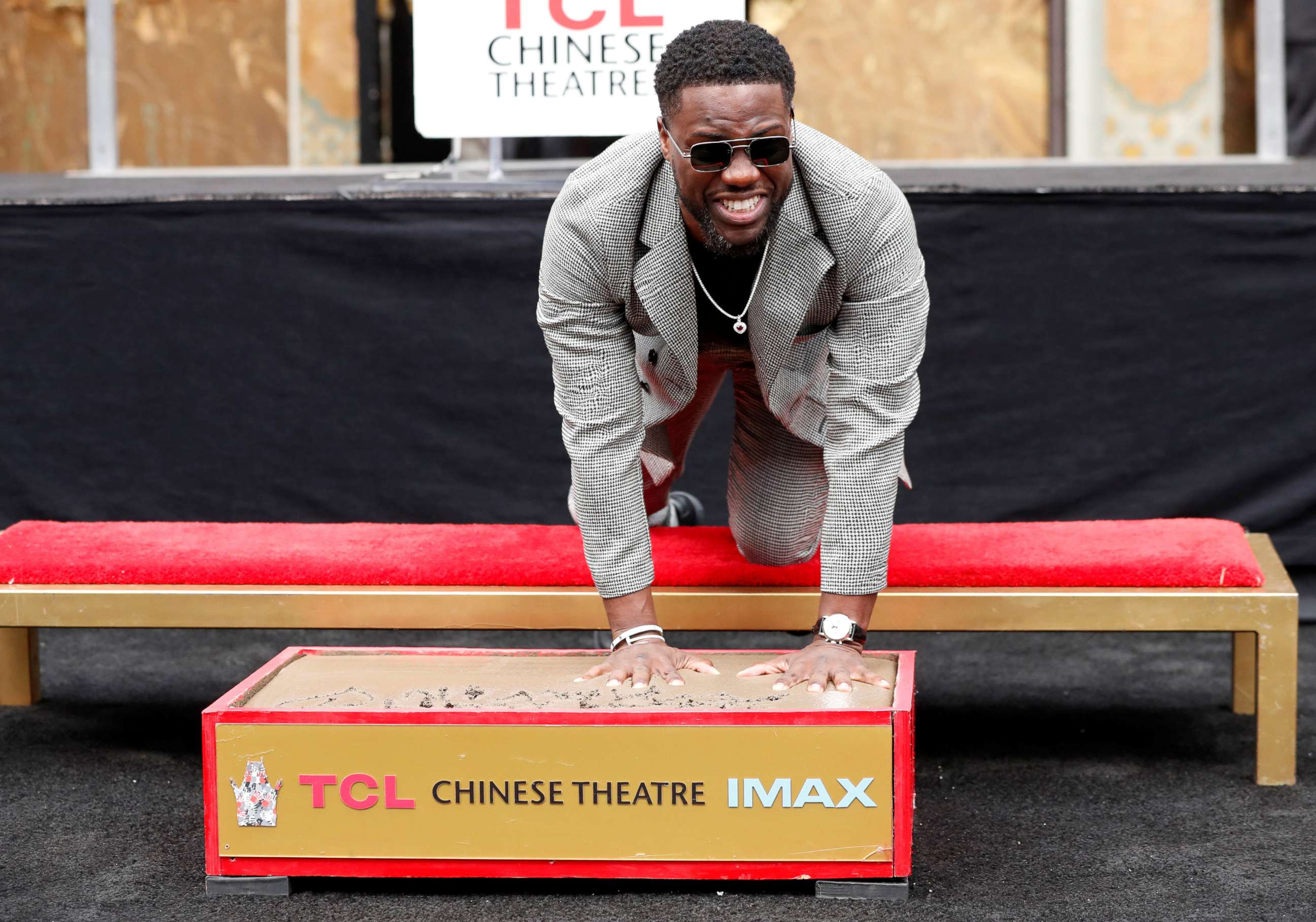 PHOTO: Actor Kevin Hart places his handprints in cement at a ceremony in the forecourt of the TCL Chinese theatre in Los Angeles, Calif., Dec. 10, 2019.