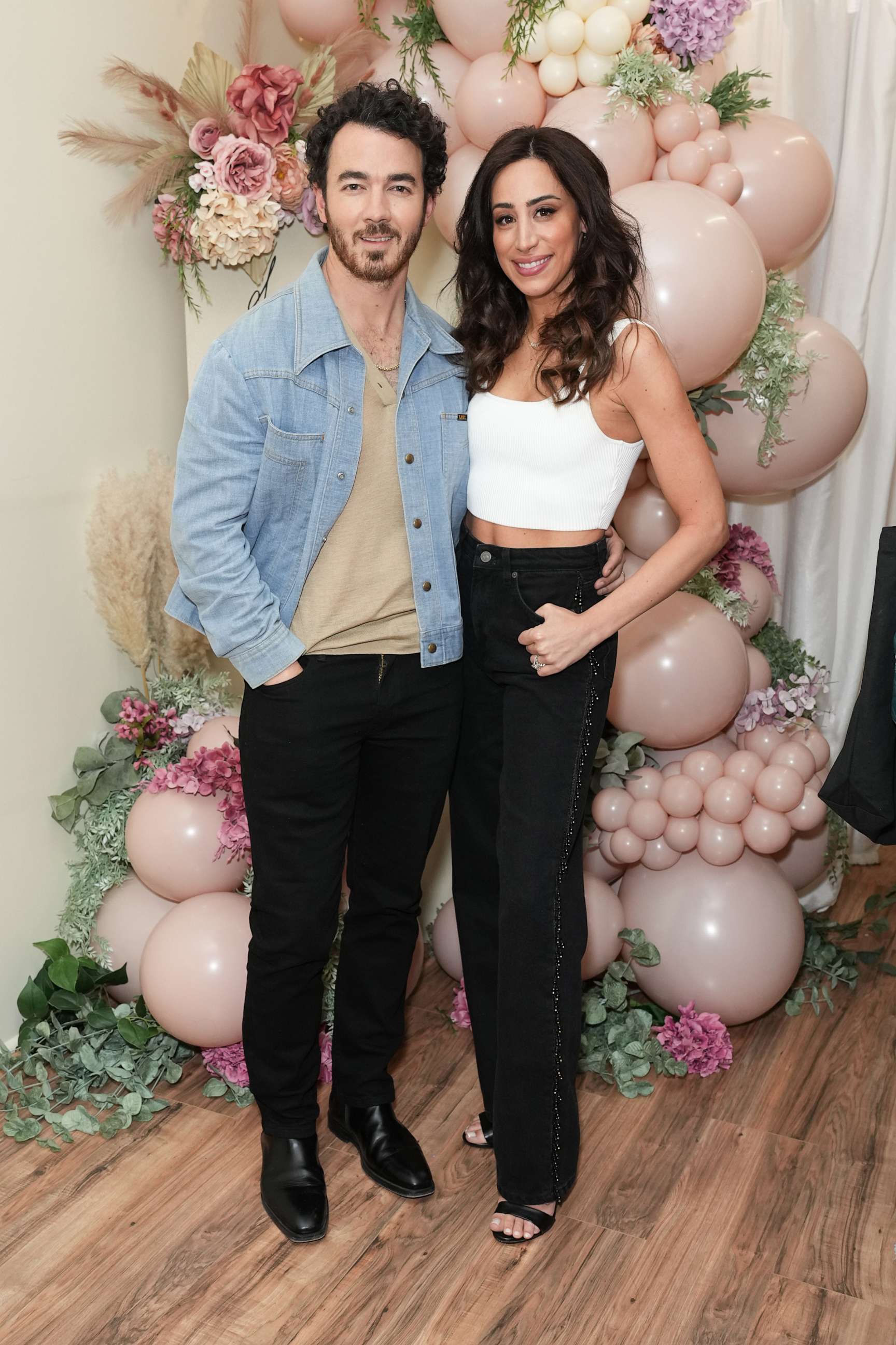 PHOTO: Kevin Jonas and Danielle Jonas attend Shop.Sip.Meet With Danielle Jonas at Sora Boutique on May 11, 2023 in New York City.