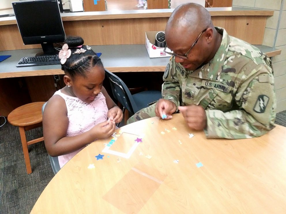 PHOTO: Kevin Matthews, who has been deployed for over a year, surrpised his daughter Kylar Matthews, 7, by attending the daddy-daughter dance at her school in Texas, March 29, 2019.