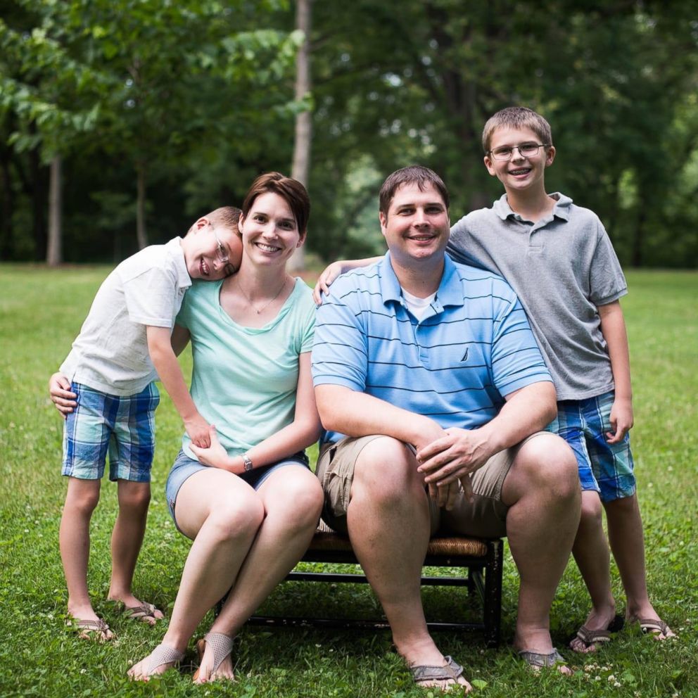 PHOTO: Abbie Dunkle, 35, of Highland, Illinois, photographed with her husband Steve Dunkle and their children. 