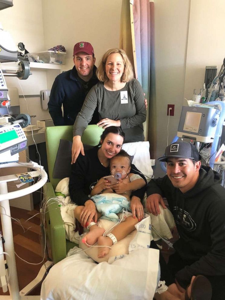 PHOTO: In this undated photo, the Perry family poses in the hospital with Susie Leroy.