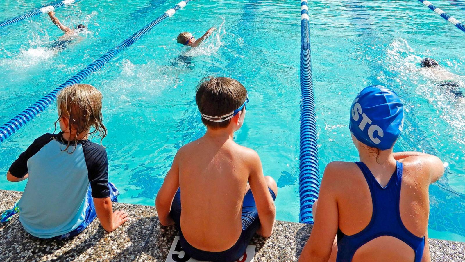 PHOTO: Children prepare to swim at meet in Winchester, Mass., July 28, 2018.