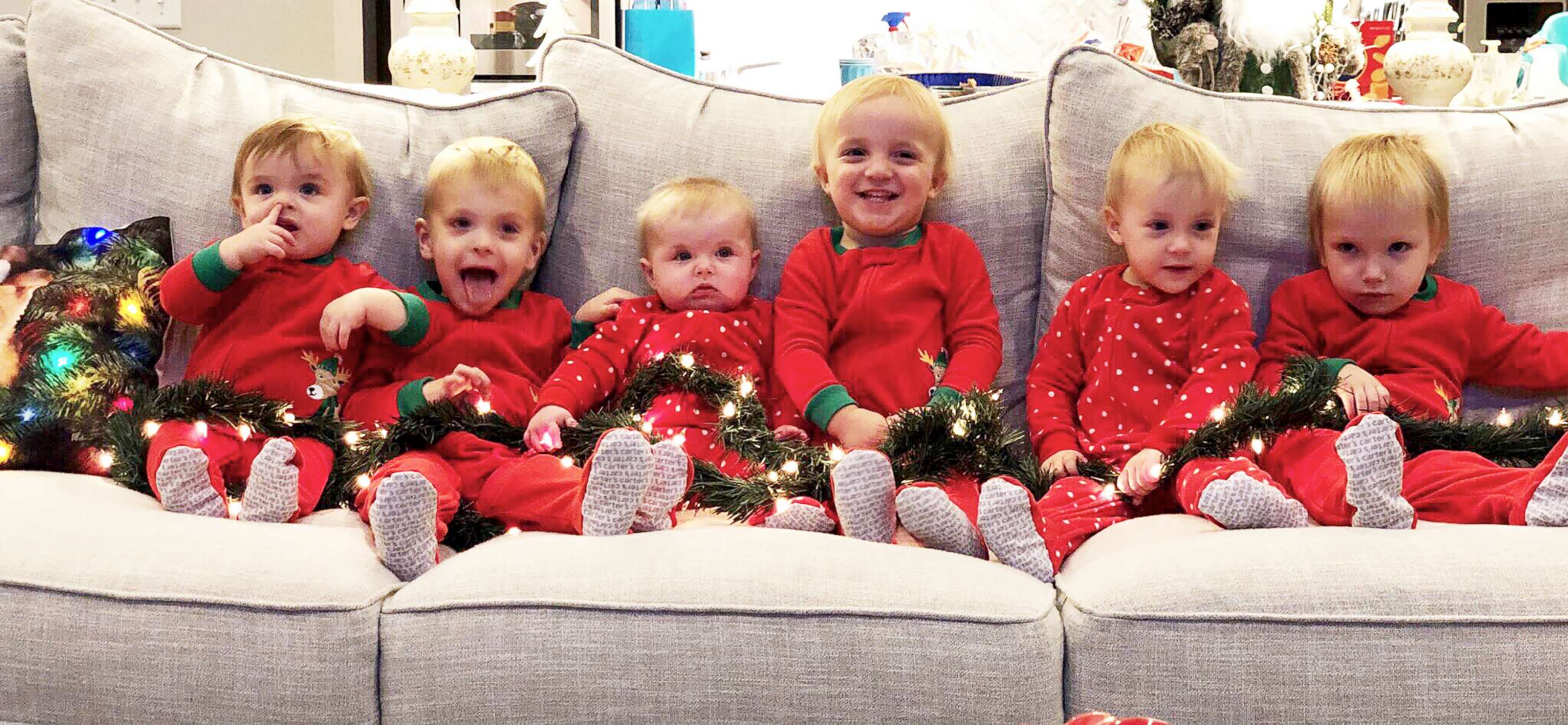 PHOTO: Kids pose for a Christmas photo. From left Hudson Daum (age 1), Carter Daum (3), Abby Eichner (7 months), twins Ben & Sophie Stockburger (2), and Luke Eichner (2). 
