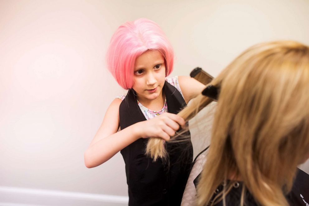 PHOTO: Alivia styled her mom's hair during a special photo shoot celebrating her future career aspirations.