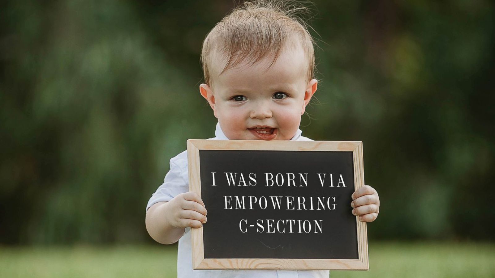 PHOTO: A child was photographed holding signs that were digitally altered to read how their parents were shamed.