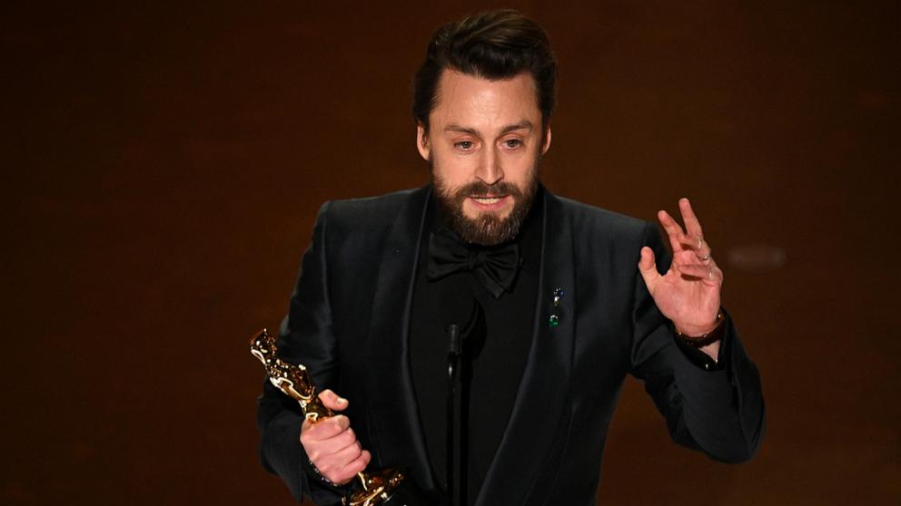 PHOTO: US actor Kieran Culkin accepts the award for Outstanding Performance by a Male Actor in a Supporting Role for "A Real Pain" onstage during the 97th Annual Academy Awards Hollywood, March 2, 2025.