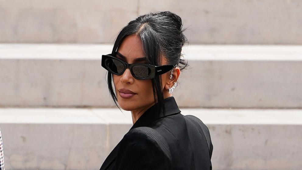 PHOTO: Kim Kardashian arrives at the Palais de Justice, wearing Alaia sunglasses, on May 13, 2025, in Paris.