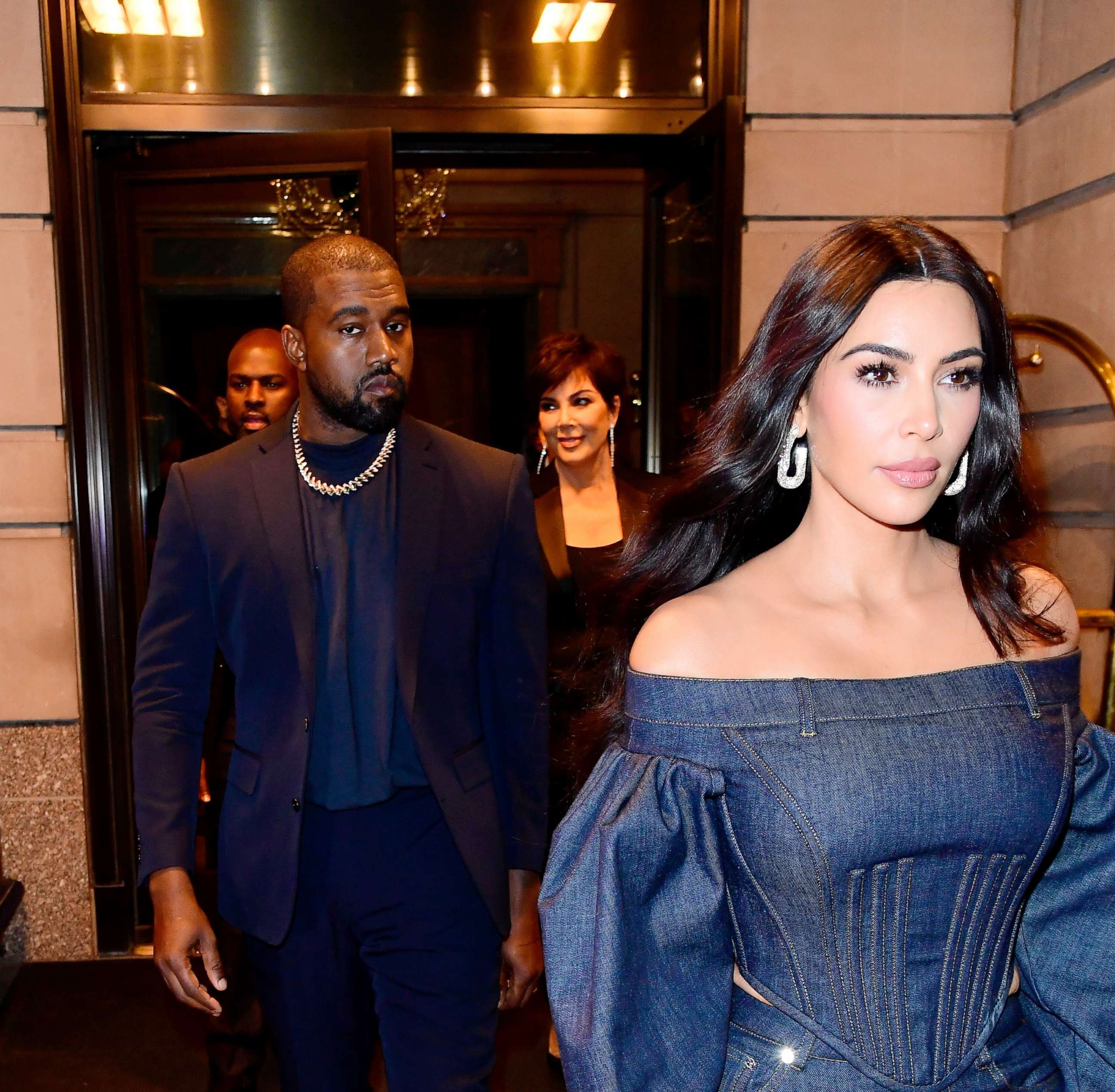 PHOTO: Kim Kardashian-West and Kanye West exit a hotel accompanied by Kris Jenner in the Manhattan area of New York on Nov 6, 2019.