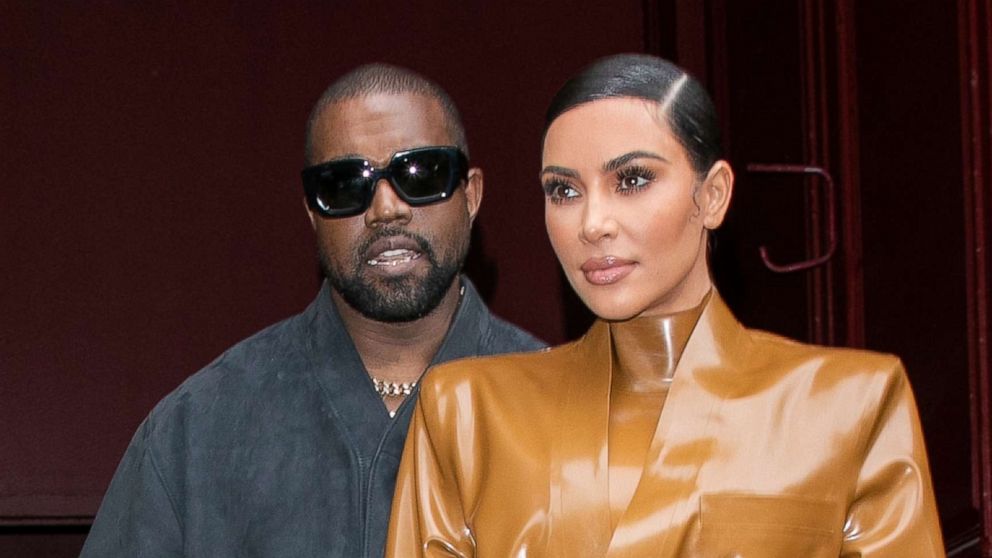 PHOTO: Kim Kardashian West and husband Kanye West leave an event during Paris Fashion Week on March 1, 2020, in Paris.