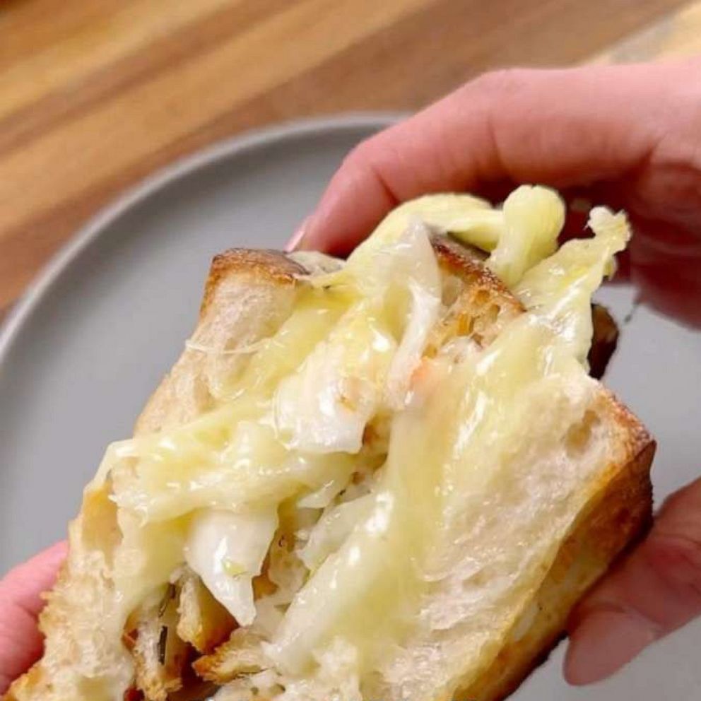 TikTok food creators share their recipes for the simple fermented cabbage and cheese sandwich, which is taking over “foodtok” and social media.
