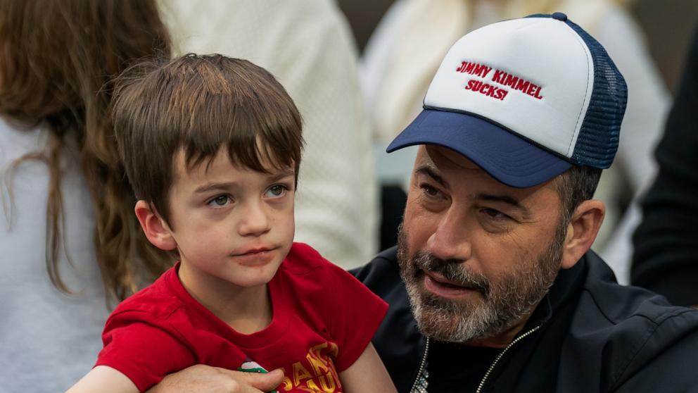 PHOTO: Jimmy Kimmel holds his son Billy Kimmel during the LA Bowl game between Washington State Cougars and Fresno State Bulldogs at SoFi Stadium on Dec. 17, 2022 in Los Angeles.