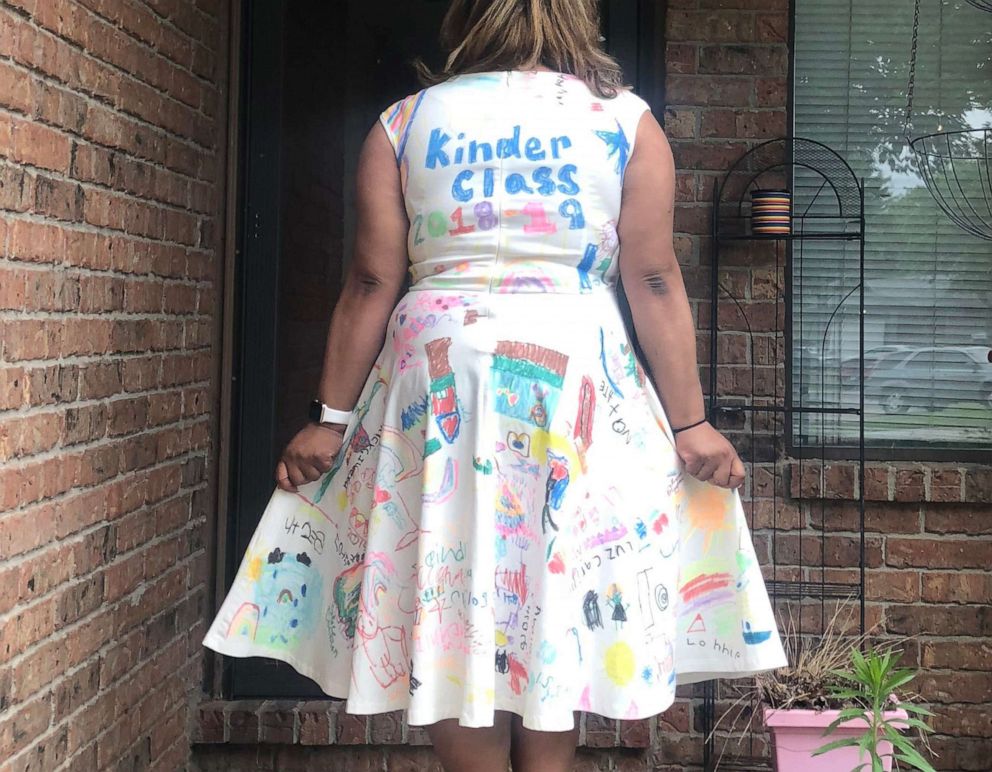 PHOTO: Wichita, Kansas kindergarten teacher Ashley Hicks had her students sign a white dress at the end of the year instead of a yearbook.