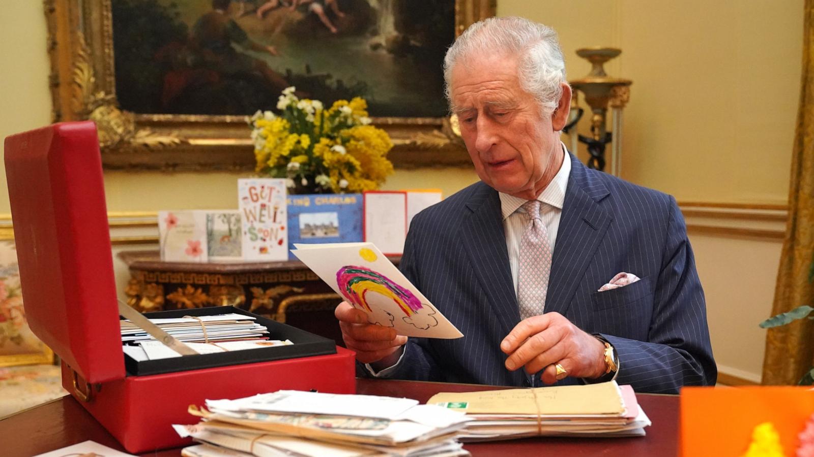 PHOTO: In this photo released on February 23, King Charles III reads cards and messages, sent by well-wishers following his cancer diagnosis, in the 18th Century Room of the Belgian Suite at Buckingham Palace, Feb. 21, 2024, in London, England.