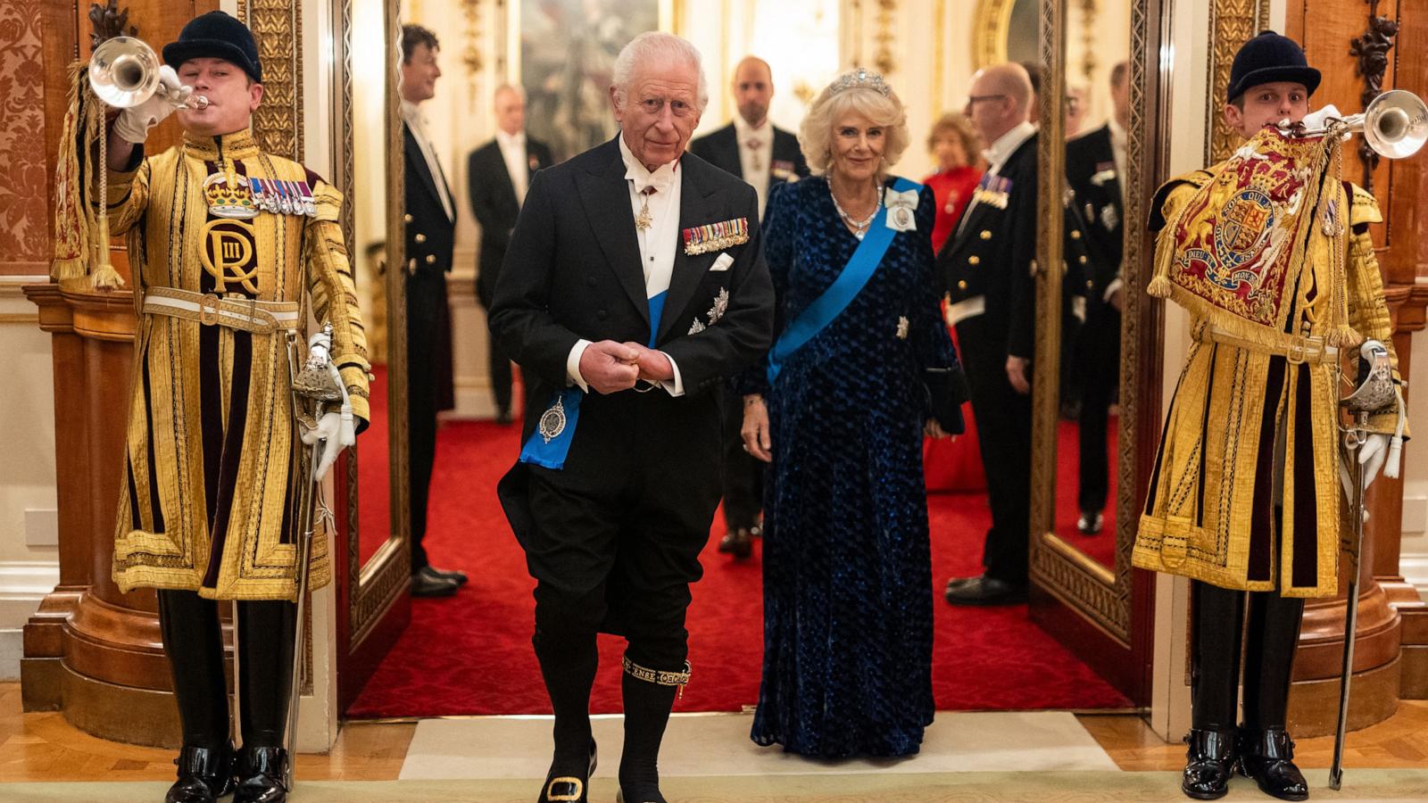 PHOTO: Britain's King Charles III and Britain's Queen Camilla arrive to meet with guests during a reception for members of the Diplomatic Corps at Buckingham Palace in London, Nov. 19, 2024.