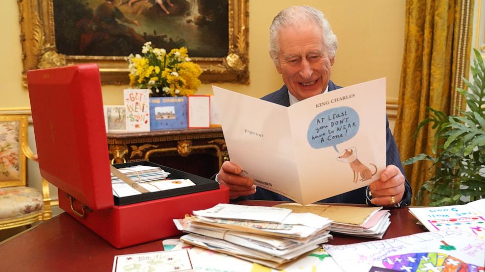 PHOTO: In this photo released on February 23, King Charles III reads cards and messages, sent by well-wishers following his cancer diagnosis, in the 18th Century Room of the Belgian Suite at Buckingham Palace, Feb. 21, 2024, in London, England. 