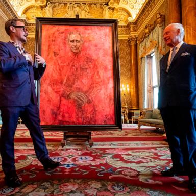 PHOTO: Artist Jonathan Yeo, left, and Britain's King Charles III at the unveiling of artist Yeo's portrait of the King, in the blue drawing room at Buckingham Palace, in London, May 14, 2024.