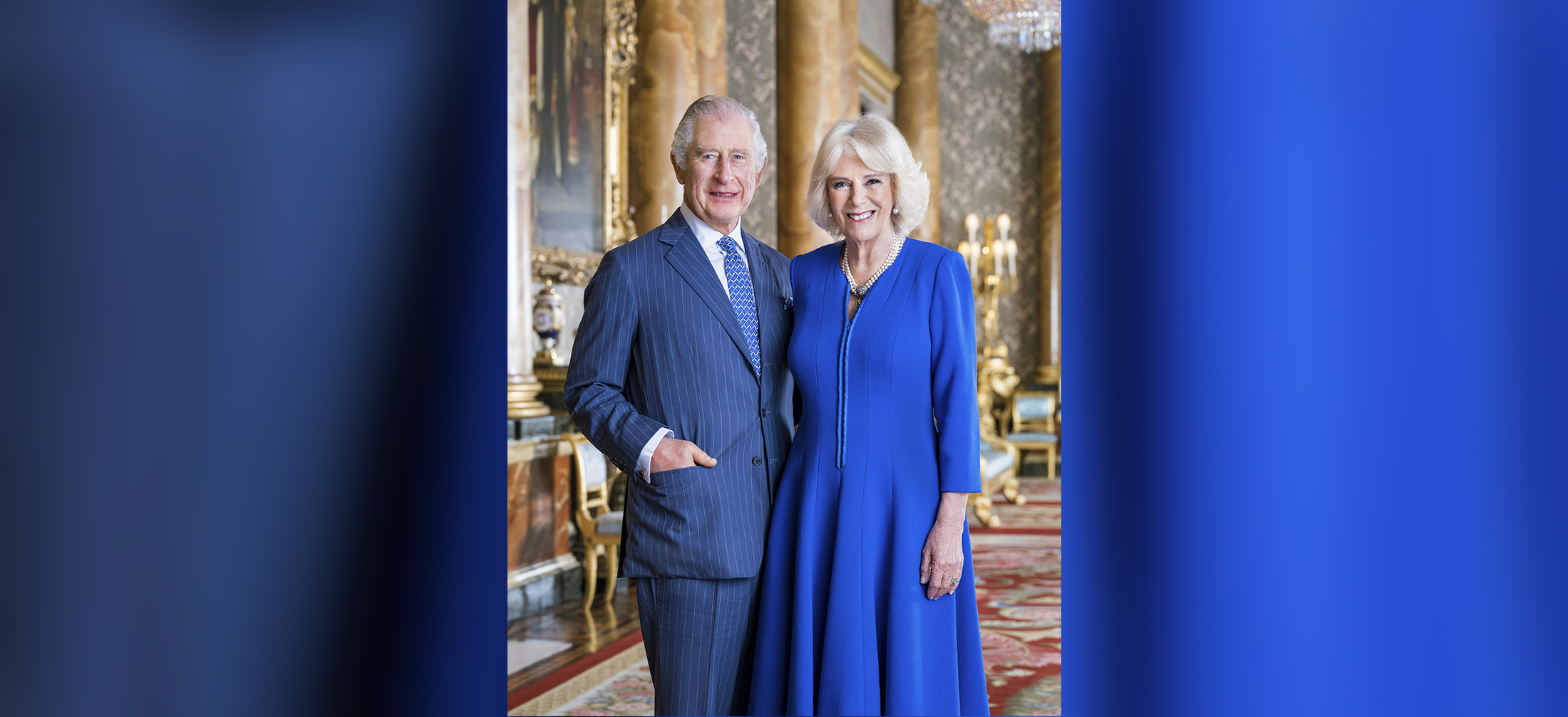 PHOTO: In this photo provided by Buckingham Palace on April 4, 2023, Britain's King Charles III and Camilla, the Queen Consort pose for a photo in the Blue Drawing Room at Buckingham Palace, London.
