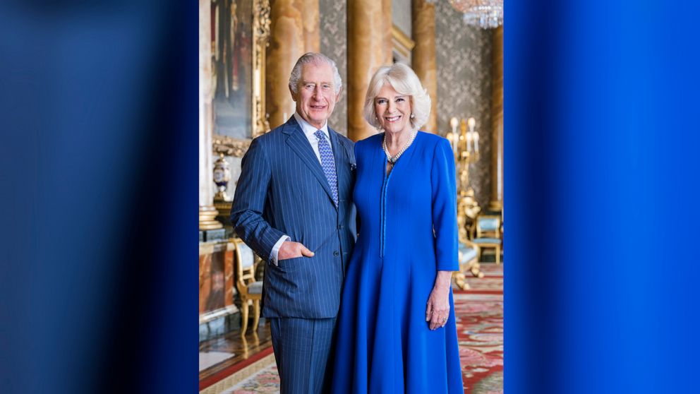 PHOTO: In this photo provided by Buckingham Palace on April 4, 2023, Britain's King Charles III and Camilla, the Queen Consort pose for a photo in the Blue Drawing Room at Buckingham Palace, London.