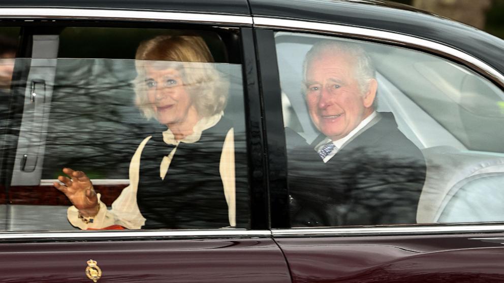 PHOTO: Britain's King Charles III and Britain's Queen Camilla wave as they leave by car from Clarence House in London, on Feb. 6, 2024.