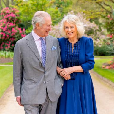 PHOTO: A handout photo issued by the Royal Household on April 26, 2024, shows Britain's King Charles III and Queen Camilla in the garden of Buckingham Palace in London, on April 10. 