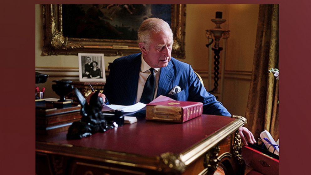 PHOTO: In this photo taken Sept. 11, 2022, Britain's King Charles III carries out official government duties from his red box in the Eighteenth Century Room at Buckingham Palace, London.