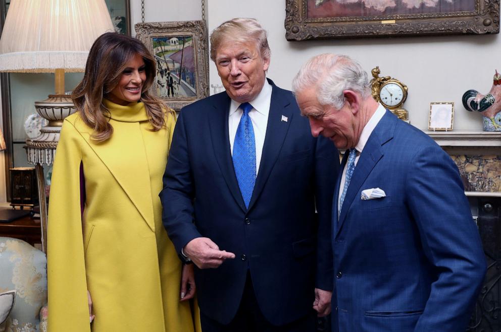 PHOTO: Prince Charles, Prince of Wales, Donald Trump and Melania Trump talk as they pose for photographs at Clarence House in central London on December 3, 2019.