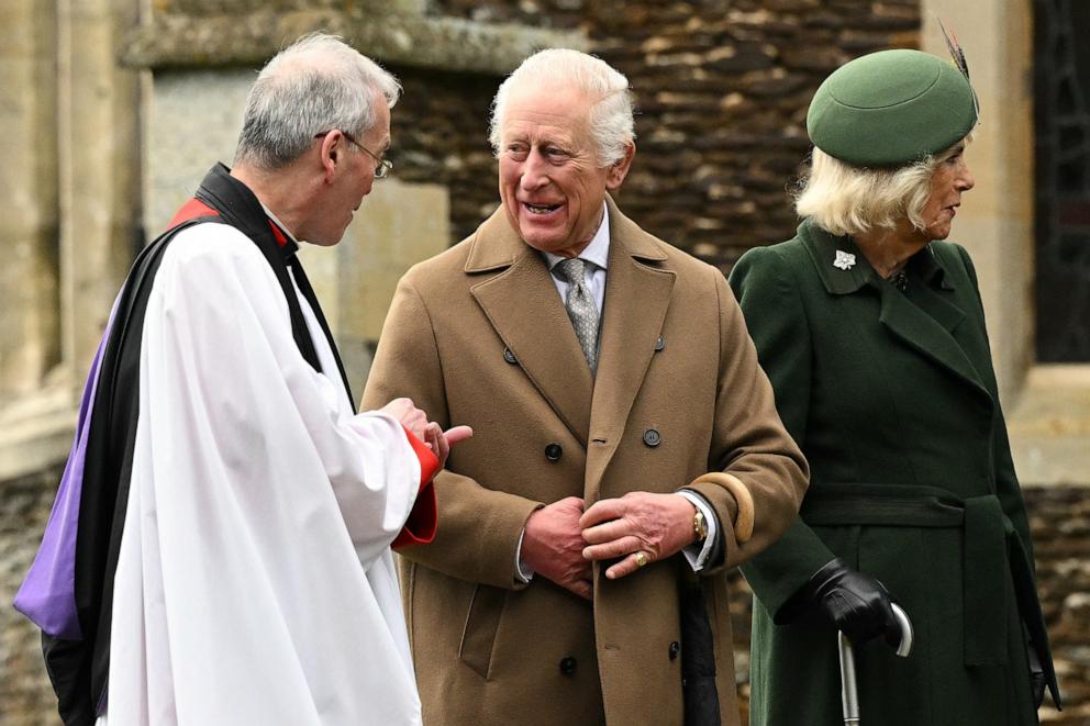 PHOTO: Britain's King Charles III talks with Reverend Canon Paul Williams after attending the Royal Family's traditional Christmas Day service at St. Mary Magdalene Church in Sandringham, Norfolk, eastern England, on Dec. 25, 2024.