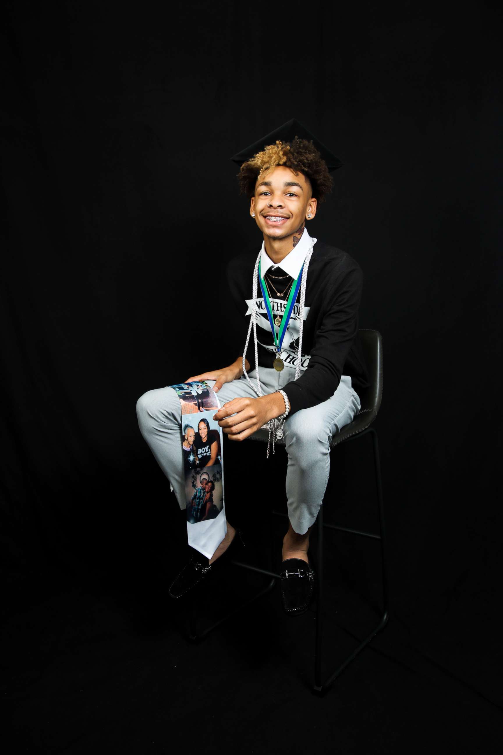 PHOTO: 	KJ Morgan, 17, from Georgia, honored his late mom, who aspired to be cheering at his graduation, with a photoshoot that included pictures of her.