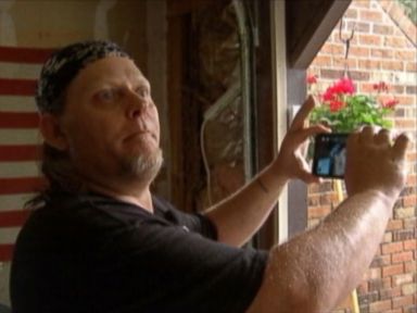 VIDEO: Chad Greenlees was knocked out by lightning while filming a passing storm from inside his garage.