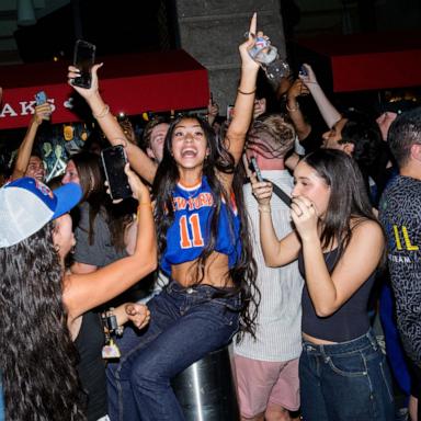 PHOTO: New York Knicks fans celebrate as they win against San Antonio Spurs in Game 5 of the NBA Finals, June 13, 2026, in New York.