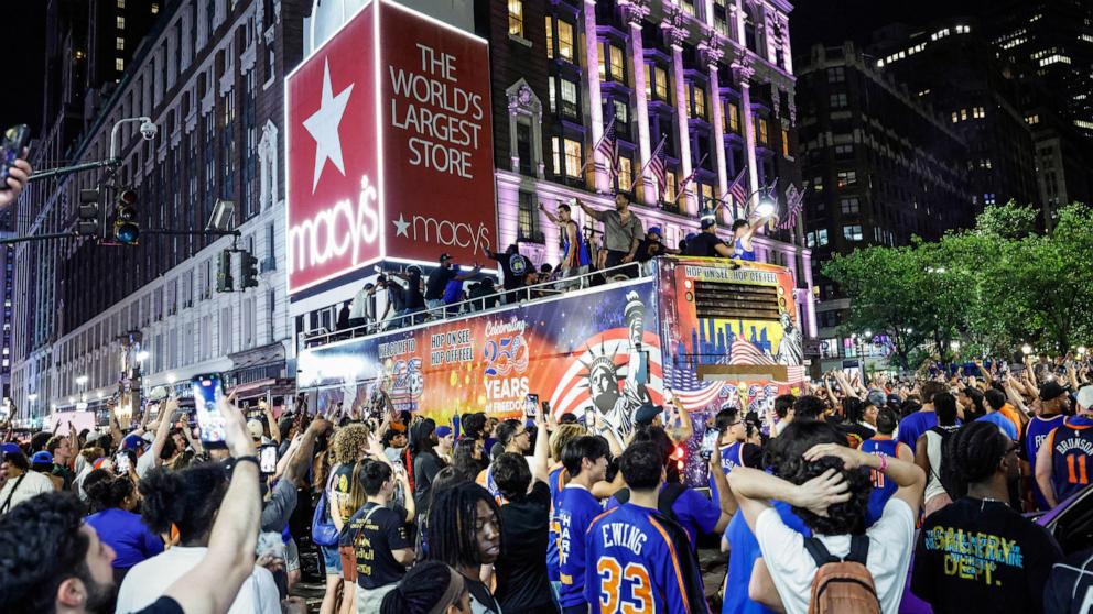 PHOTO: Knicks fans celebrate in Central Park after the New York Knicks defeated the San Antonio Spurs in Game 5 of the NBA Finals to win the series, in New York, on June 13, 2026.