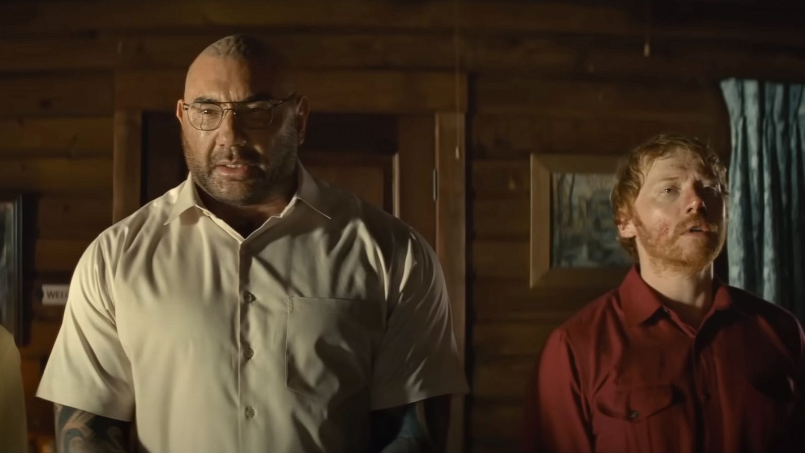 PHOTO: Dave Bautista, Nikki Amuka-Bird, and Rupert Grint are shown in a scene from the movie, "Knock At The Cabin."