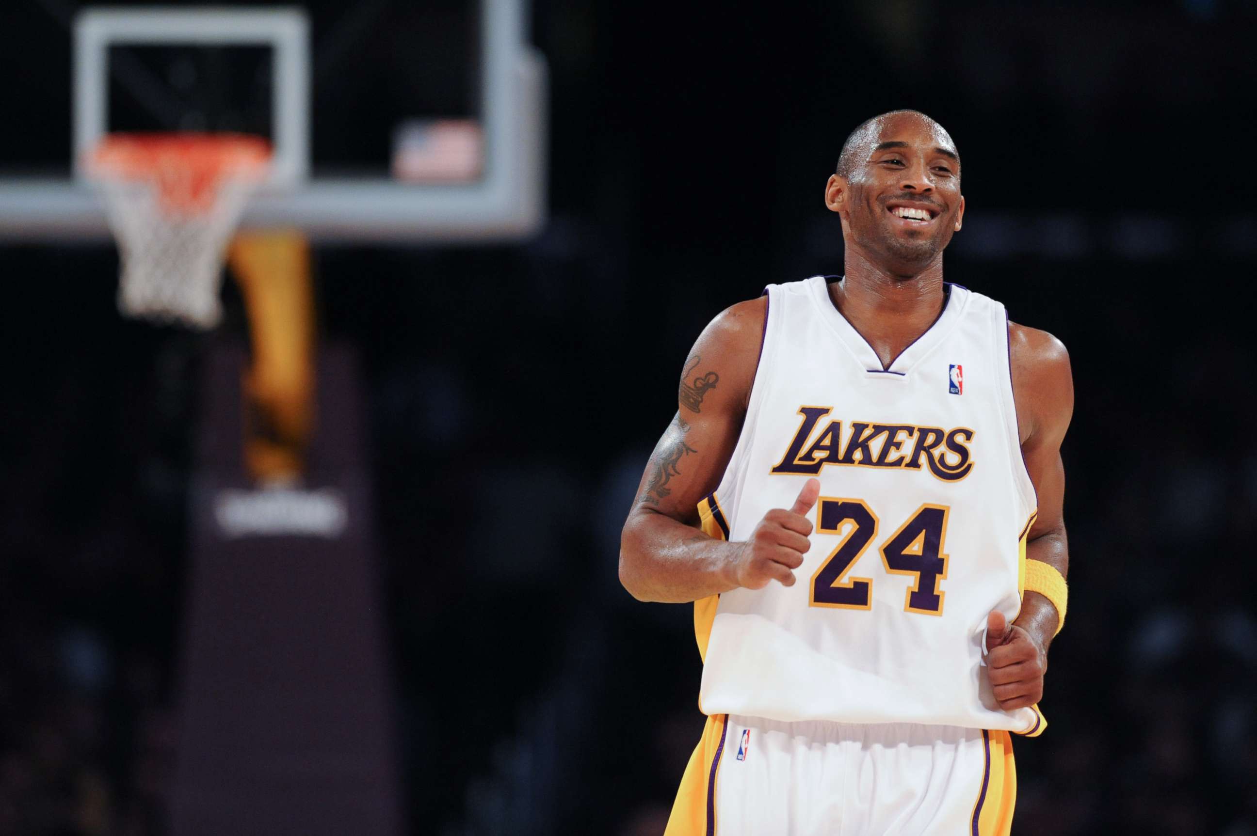 PHOTO: Kobe Bryant #24 of the Los Angeles Laker smiles while backpedaling on defense against the Minnesota Timberwolves at Staples Center on December 14, 2008 in Los Angeles, California.