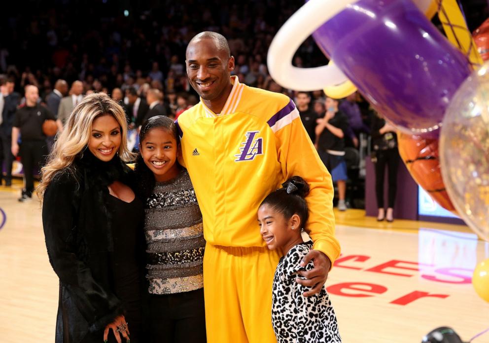 PHOTO: In this Dec. 19, 2014, file photo, Kobe Bryant of the Los Angeles Lakers poses with wife Vanessa and daughters Gianna (L) and Natalia before the game with the Oklahoma City Thunder, at Staples Center, in Los Angeles.