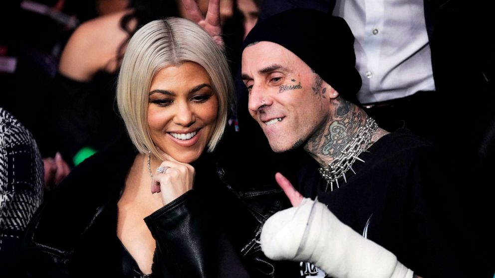 PHOTO: FILE - Kourtney Kardashian and Travis Barker attend the UFC 285 event at T-Mobile Arena, March 04, 2023 in Las Vegas.