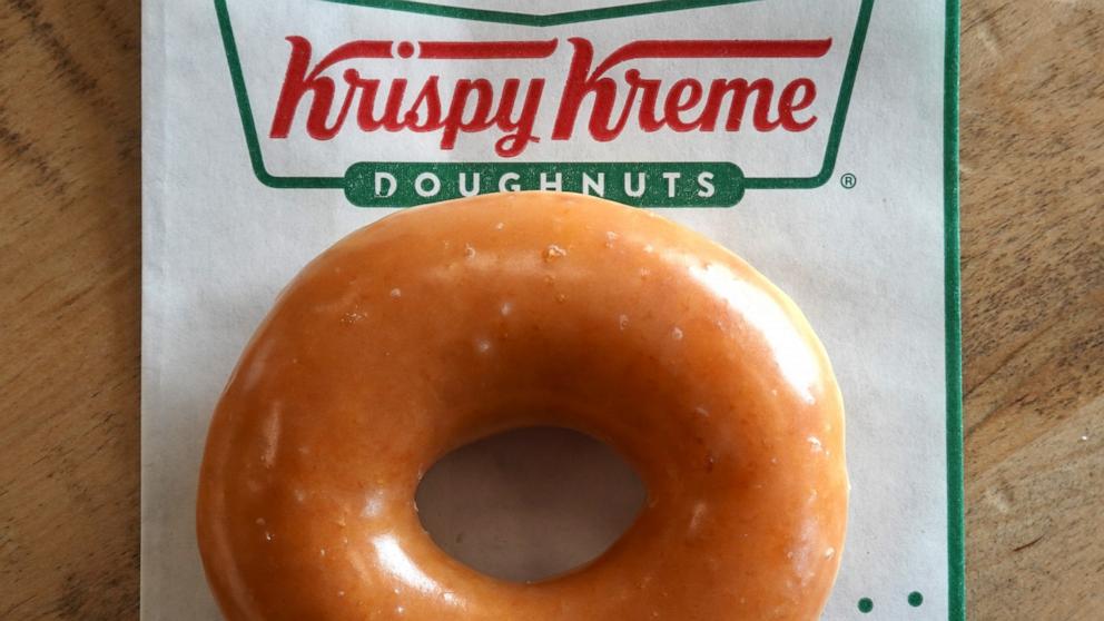 PHOTO: In this May 12, 2022, file photo, a Krispy Kreme glazed doughnut is shown in Daly City, Calif. 