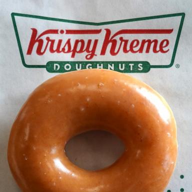 PHOTO: In this May 12, 2022, file photo, a Krispy Kreme glazed doughnut is shown in Daly City, Calif. 