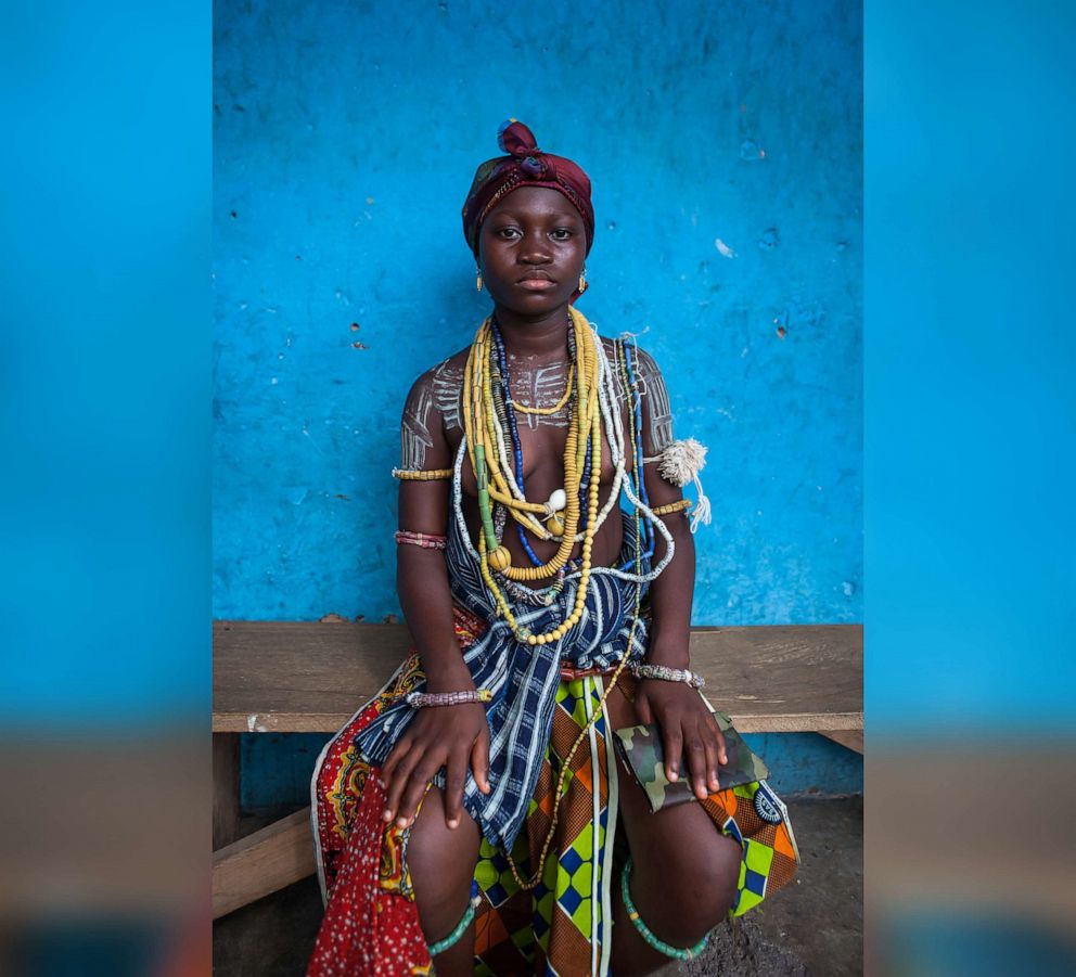 PHOTO: A young woman from the Krobo tribal group in Ghana wears traditional beads for an adulthood ceremony in 2013.
