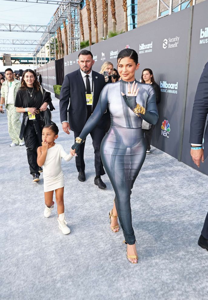 PHOTO: Stormi Webster and Kylie Jenner arrive at the 2022 Billboard Music Awards held at the MGM Grand Garden Arena on May 15, 2022.