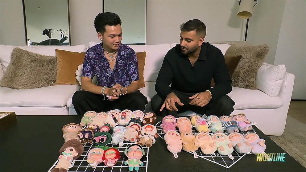 PHOTO: After buying his first Labubu in January 2025, Kevin Duong (left) tells ABC News’ Ashan Singh (right) that he has since spent more than $1000 on his Labubu collection.